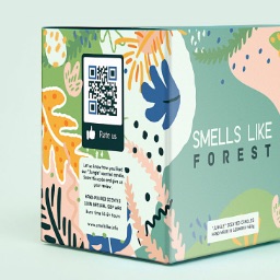 Exemplo de uso de um QR Code em uma embalagem de vela perfumada.